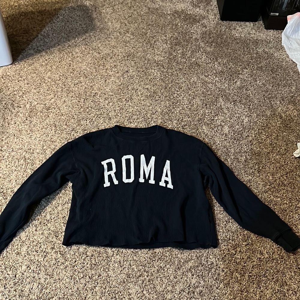 This Navy blue long sleeve tee is all the way from Italy. I out grew it.